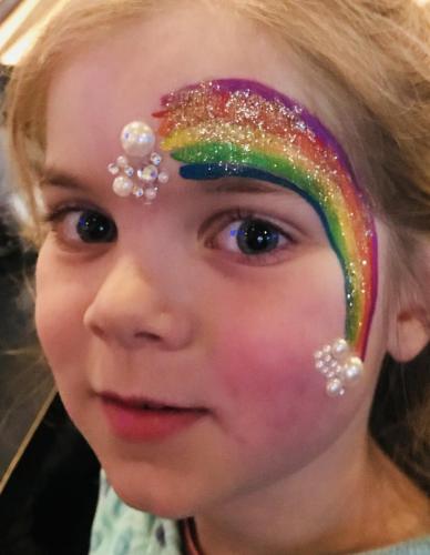 Rainbow face painting with glitter Chicago 